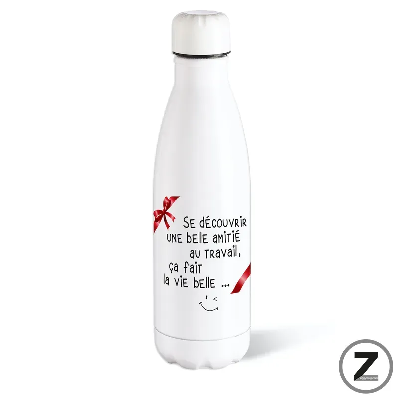 White bottle with a red ribbon graphic and French text about discovering a beautiful friendship at work, plus a smiley face.