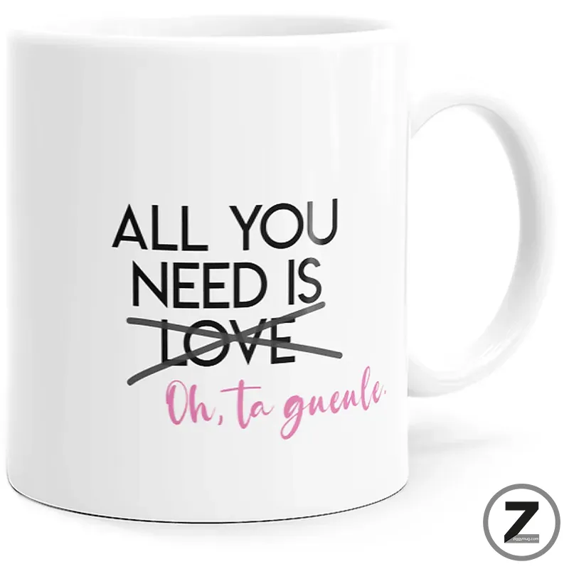 Mug All You Need : le motif et le message sont présentés de face. Mug All You Need blanc avec message « All you need is love… Oh, ta gueule ! »