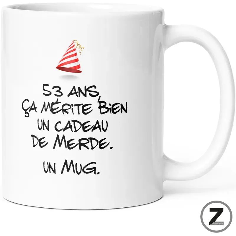 White mug featuring a playful party hat and bold French slogan: '53 ans ça mérite bien un cadeau de merde. Un mug.'