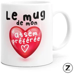 White mug featuring a pink heart and the French phrase 'Le mug de mon âme préférée'