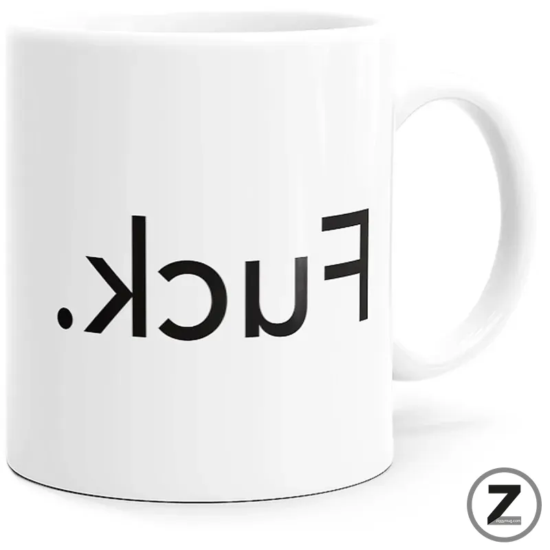 White ceramic mug with black text reading 'fuck' shown upside down from the side?