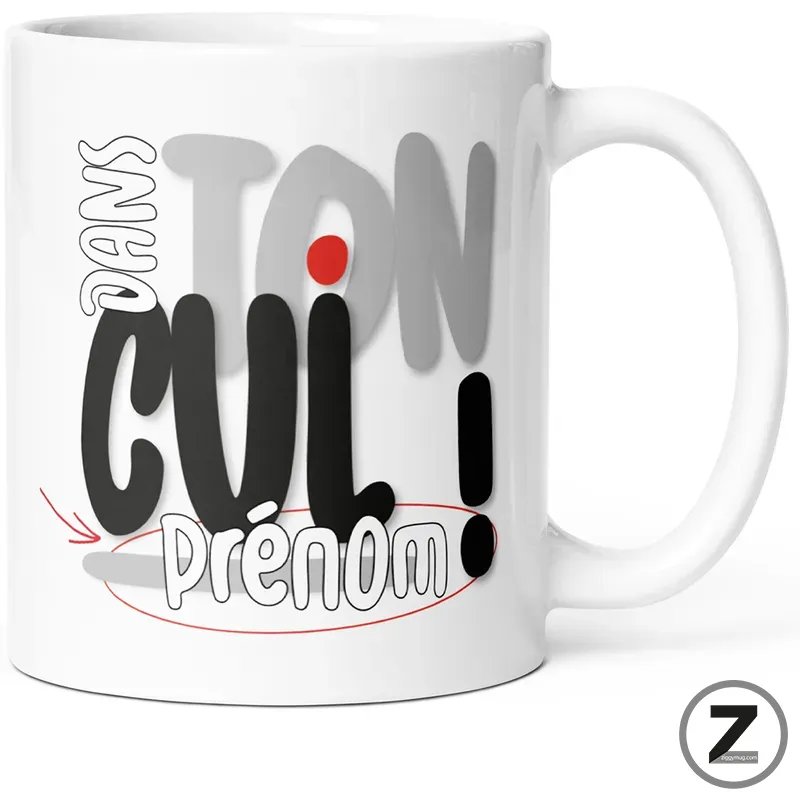 White mug with bold, overlapping typography forming a name graphic; includes 'prenom' and a red dot, with a small Z-brand mark.