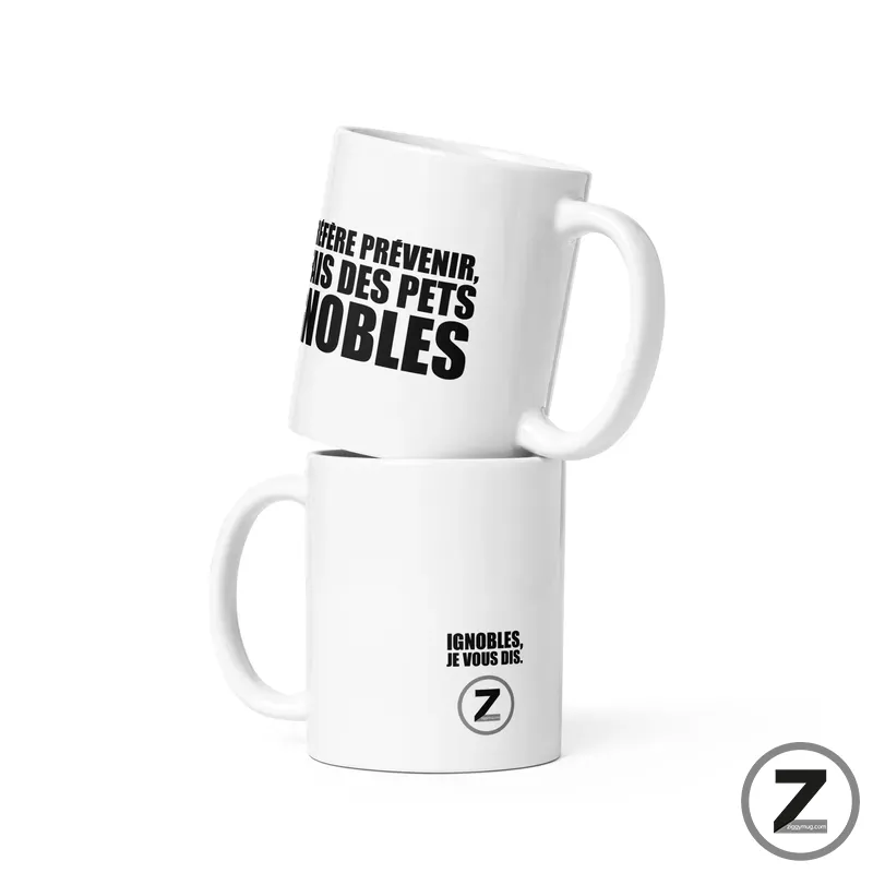 Two stacked white mugs with bold French text and a circular Z logo in the corner.