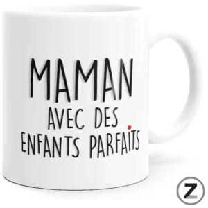 White ceramic mug featuring black handwritten French text 'Maman avec des enfants parfaits' and a small red heart.