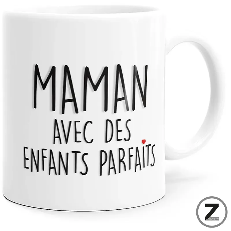 White ceramic mug featuring black handwritten French text 'Maman avec des enfants parfaits' and a small red heart.
