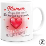 White mug with a large pink heart and a French message for mom: 'Maman, à chaque fois que tu touches ce coeur, tu sauras que je t’aime! Plein de bisous!'