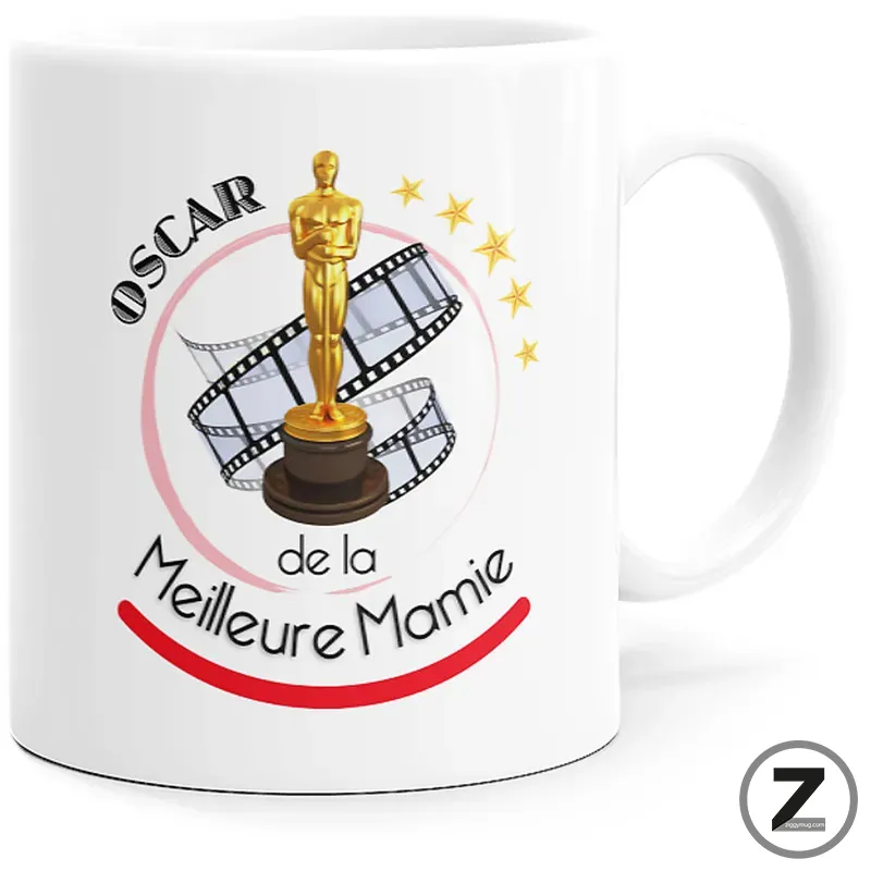 White mug featuring an Oscar statue on a film reel with stars and the text 'Oscar de la Meilleure Mamie' (celebrating the best grandma).
