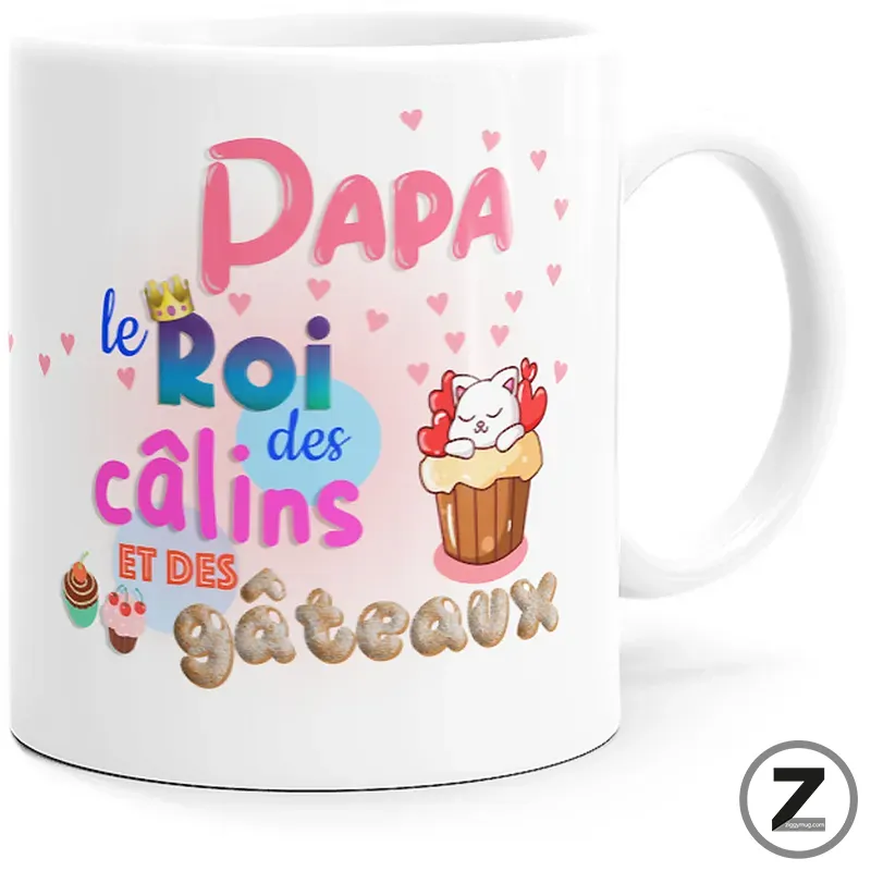 White mug with colorful French greeting: 'Papa le Roi des câlins et des gâteaux' with hearts, cupcakes, and a cat cupcake illustration.