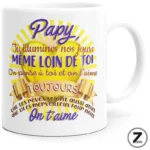 White mug featuring a colorful French message for 'Papy' with sunburst backdrop and gold ribbon reading 'On t'aime'. (gift mug)