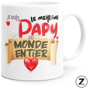 White mug printed with the French phrase 'Je suis le meilleur papa du monde entier' in bold red and black letters with small red hearts and a parchment-style banner.