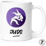 White mug displaying a purple circle logo with two white Judo figures in a throw and the word JUDO below.