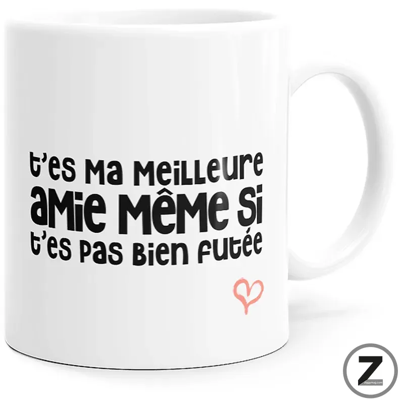 White mug featuring a bold French phrase and a small pink heart outline at the bottom right.