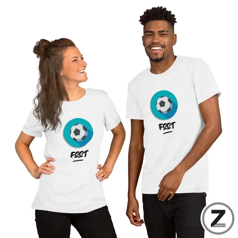 Two people wearing white T-shirts with a blue circular soccer-ball graphic, smiling at each other.